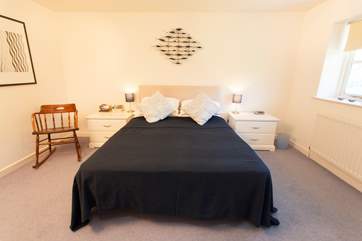 The master double bedroom, with access to the Jack and Jill bathroom.