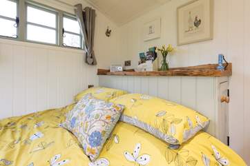 There is a comfy king-size bed with lovely linens.
