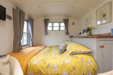 There is a window at the end of the comfy king-size bed, so you can enjoy a lie-in with a view.