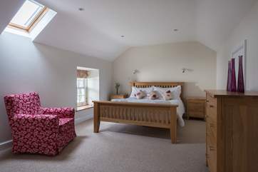 The master bedroom is spacious.
