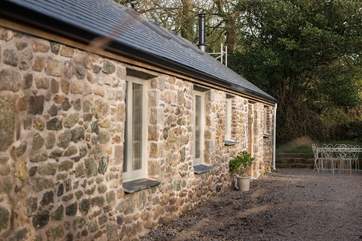 There is a seating area at the end of the barn and around the back too.