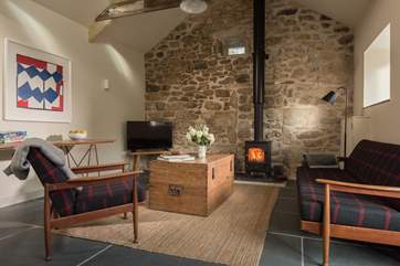 Light the wood-burner for a gorgeous evening glow and snuggle up on the sofa.