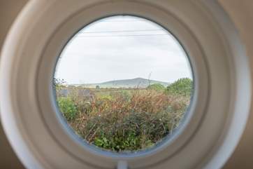 You can see St Agnes Beacon through the porthole window.