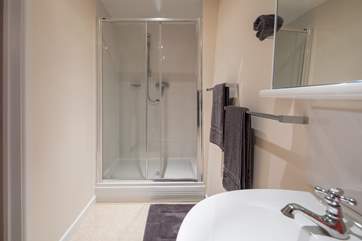 The large walk-in shower in the en suite for bedroom 2.