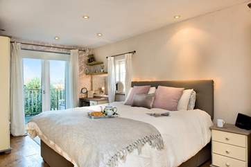 The cottage has four delightful bedrooms.