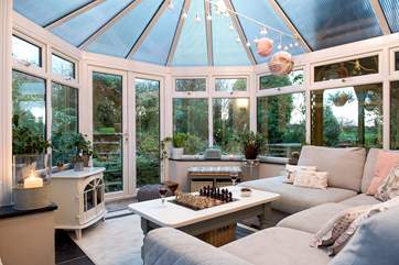 The conservatory is a lovely place to gather.