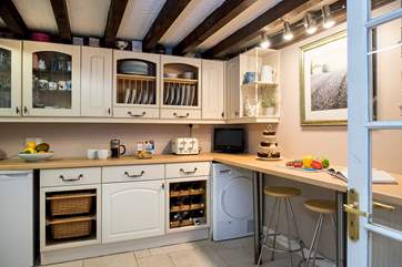 You can access the conservatory from the kitchen.