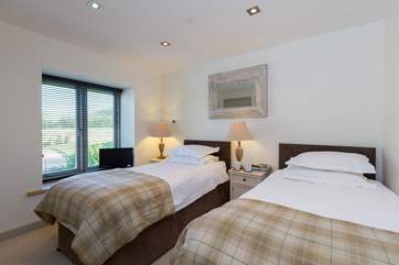 The twin bedroom is also on the first floor - all the bedrooms have plenty of storage in fitted wardrobes.