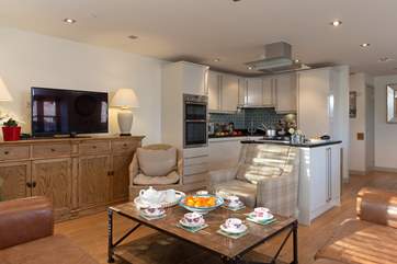 Back at Hayloft the ground floor is open plan, with doors to the patio and fully enclosed lawned garden.