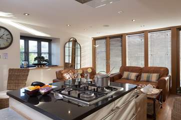 The fabulous kitchen island is a focal point in this sociable space.