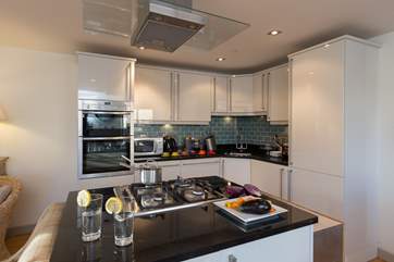 The bespoke kitchen is exceptionally well-equipped to make this lovely property a real home-from-home.