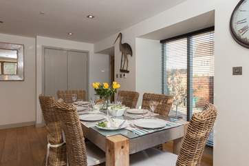 Another view of the dining-area. The front door to the property is beyond it, in the corner of the room.