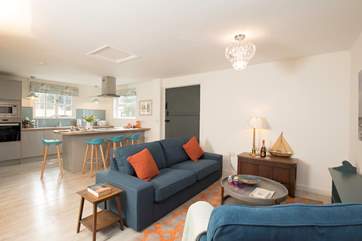 The open space living-room and kitchen area are perfect for entertaining and watching the younger ones play whilst you cook up some lunch.