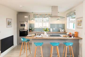 What a beautiful kitchen to cook and bake in, with views across to the stables and paddocks.