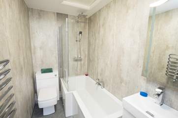 The new modern bathroom to relax in a nice warm bath after your day exporing the Island.