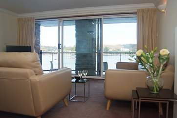 There is a grandstand view of the water activities from the sofas.