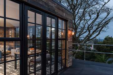 The hot tub will be out on the deck where you can enjoy the view.