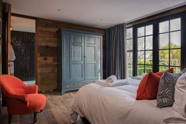A beautiful bedroom with wonderful views and this bed can be made up as two single beds on request.