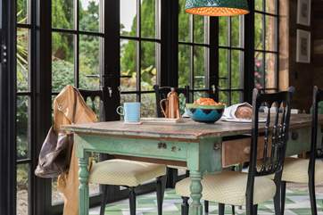 Dining with a view over the lush gardens.