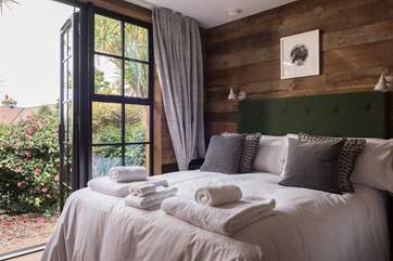 Doors open up onto the garden terrace.