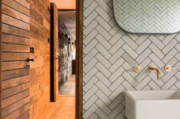 The fabulous wet-rooms are both fully tiled with glass shower screens.