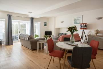 The open plan living-room is a lot more spacious than expected.
