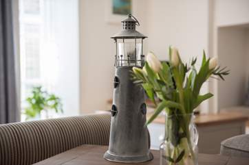 Lovely coastal touches reference Falmouth's maritime history.
