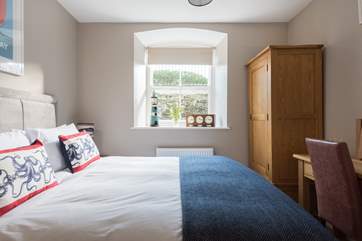 Solid oak furniture in both bedrooms.