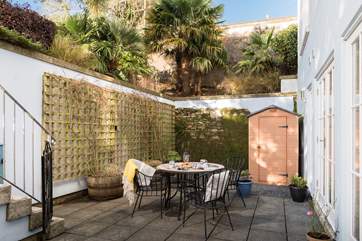 High walls shelter the courtyard and the south-facing aspect make it a wonderful sun-trap.