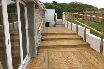 The steps lead down to the front door, please take care.
