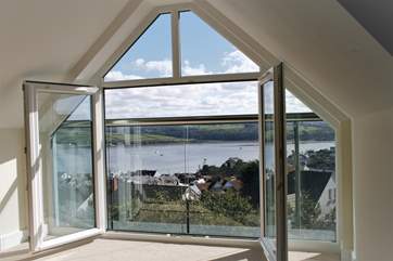This is the stunning view from the master bedroom - there are bespoke wooden screens that fit the window space.