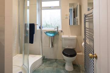 The family bathroom is at the top of the steps, allowing easy access for showering off the sand and salt from a fun packed day on the beach.