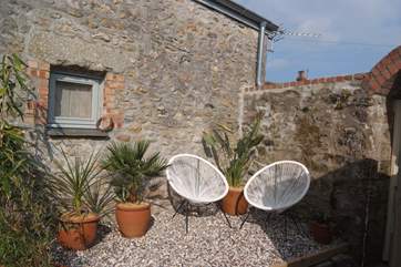 Enjoy al fresco dining in the private courtyard.