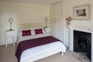 This super spacious room also looks out over towards the water.