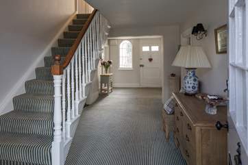This glorious entrance hall connects the ground floor, with the stairs leading to the grand landing of the first floor.