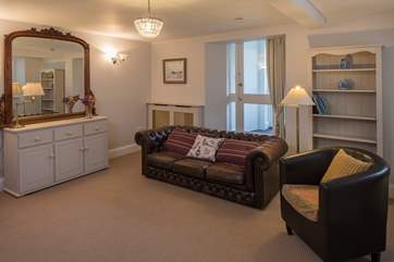 The second sitting-area provides a great space to indulge in traditional family fun and games. Anyone for a game of charades?