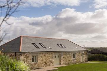 The Cow Shed is the barn on the left, with private parking for guests to the left of the photo. A fence to divide the gardens is due any day now...