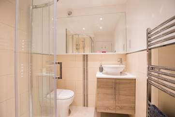 The modern en suite off the master bedroom for a peaceful morning shower.