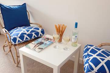 Sit back and relax with a glass of wine.
