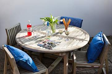 Sit back and enjoy the sunshine in the rear and private patio area