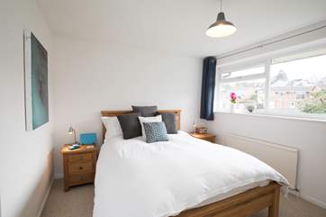 The master bedrooom with a generous super-king size bed perfect for morning lie ins.