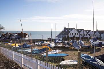 Walk down a pathway next to the boat yard, straight onto the seafront.