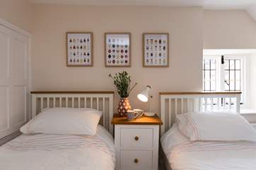 This is the twin bedroom in the cottage. There is a door that leads to the family bathroom that then leads on to the rest of the main house. This door can be locked for privacy from each side if gues