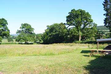 This is the fabulous meadow complete with pizza oven and picnic bench. What a place to enjoy.