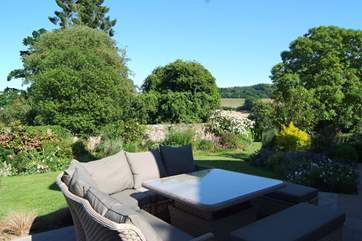 As well as the verandah there is another seating area outside the kitchen where you can choose sunshine or shade.