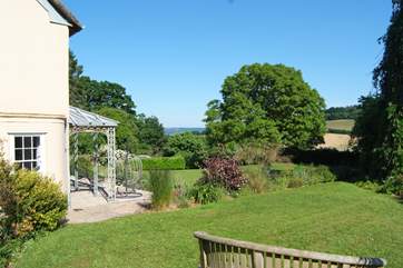 The gardens wrap around the main house and the cottage has its own secret courtyard garden too.