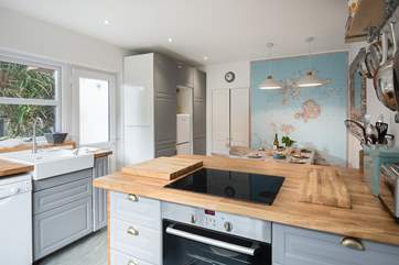 The kitchen/dining-room has a big island/breakfast-bar.
