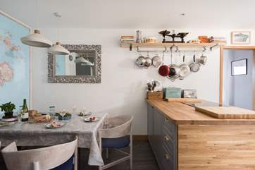 A beautifully appointed cook's kitchen/dining-room.