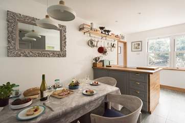 A convivial cooking and dining area.