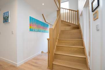 The beautifully built staircase is a focal point in the property.